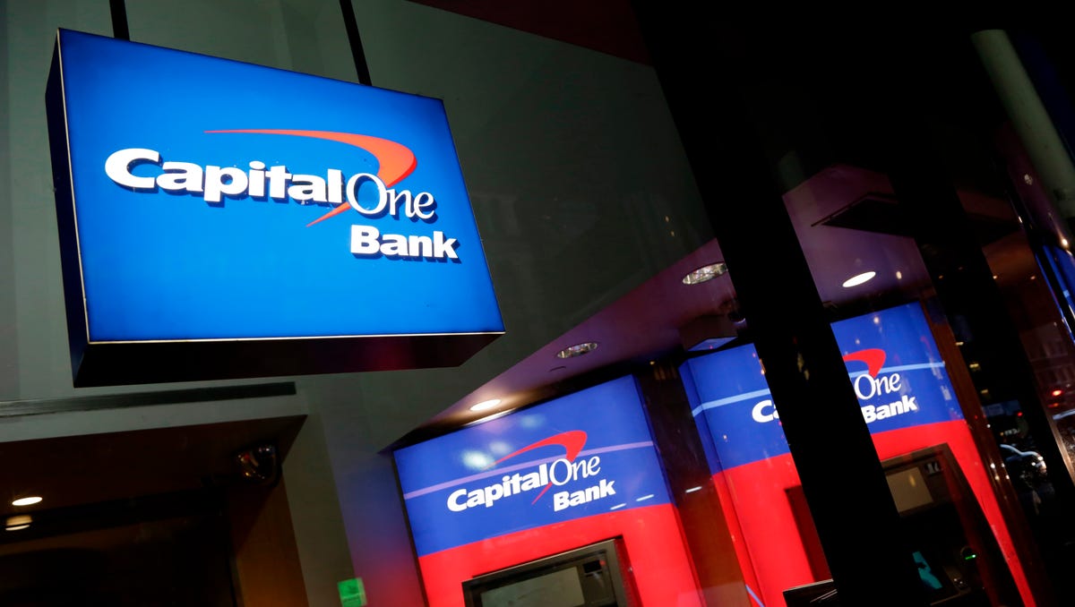 FILE - This Nov. 23, 2015, file photo shows a Capital One bank in New York. Capital One Financial Corp. reports earnings Tuesday, April 24, 2018. (AP Photo/Mark Lennihan, File) ORG XMIT: NYBZ257