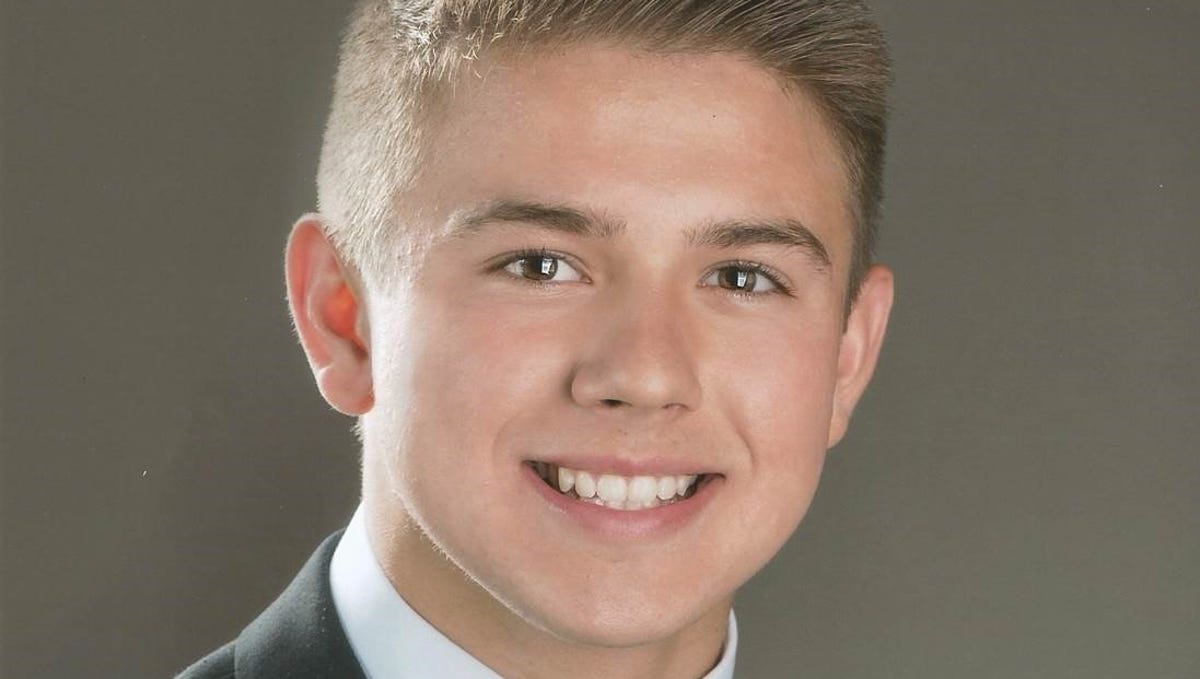 Maison Hullibarger, whose family objected to the references to suicide made by their priest at the 18-year-old's funeral on Dec. 8, 2018, is shown in a high school photo.