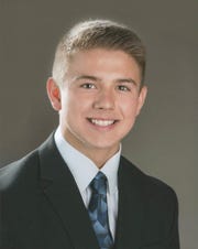Maison Hullibarger, whose family objected to the references to suicide made by their priest at the 18-year-old's funeral on Dec. 8, 2018, is shown in a high school photo.