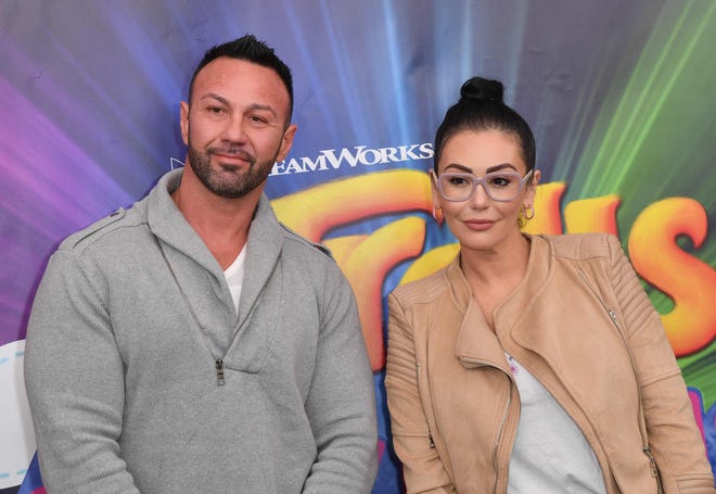 Roger Mathews and Jenni "JWoww' Farley attend DreamWorks Trolls The Experience on Nov. 14, 2018 in New York City.