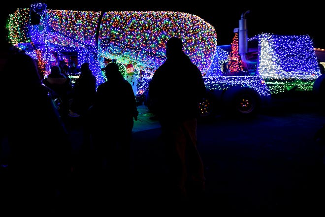 Cement trucks wrapped in Christmas lights bring cheer to NJ roads