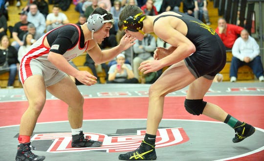 Fair Lawn's AJ Puerto, grey, wrestles Cresskill's Kenny Spadaccini in the 152 pound class at the Cutter Classic wrestling tournament in Fair Lawn on Saturday, Dec. 15, 2018