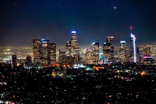The downtown LA skyline, photographed from Griffith Park just after sunset.
