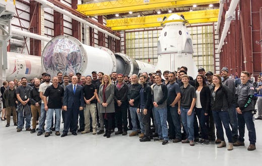 Pence posed for pictures with SpaceX personnel in their hangar at Kennedy Space Center on Dec. 18, 2018, the day Pence announced the creation of a U.S. military unified command for space.
