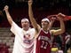 Wisconsin's Jon Bryant, left, and Mike Kelley (22) celebrate after cutting down the nets following Wisconsin's 64-60 NCAA West Regional win over Purdue Saturday, March 25, 2000.