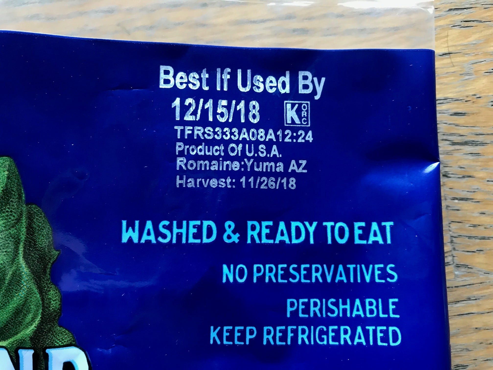 The labeling is shown on a package of romaine lettuce from a Tempe grocery store.