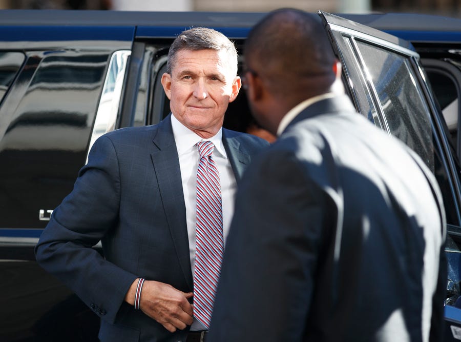 President Donald Trump's former national security adviser Michael Flynn arrives for his sentencing at the U.S. District Court in Washington, Tuesday, Dec. 18, 2018. 