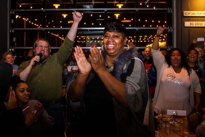 Royceann Porter celebrates with supporters following her victory for Johnson County Supervisor during at a special election watch party on Tuesday, Dec. 18, 2018, at Big Grove Brewery in Iowa City.