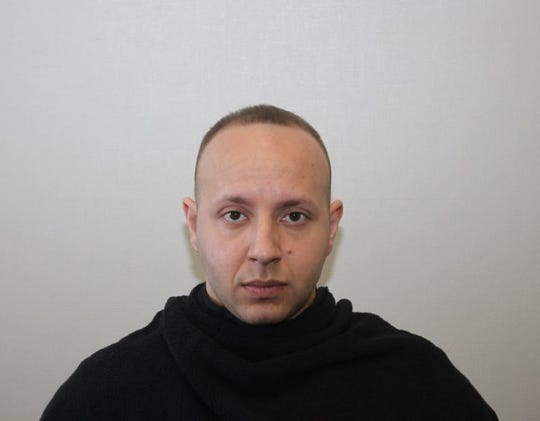 Paterson police officer Matthew Torres was arrested by federal agents, and charged with participating in an illegal traffic stop in Paterson last December.