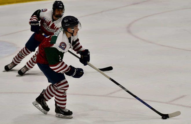 Plymouth alum Drew Garby (2) handles the puck for the NAHL's Fairbanks Ice Dogs during a recent contest.