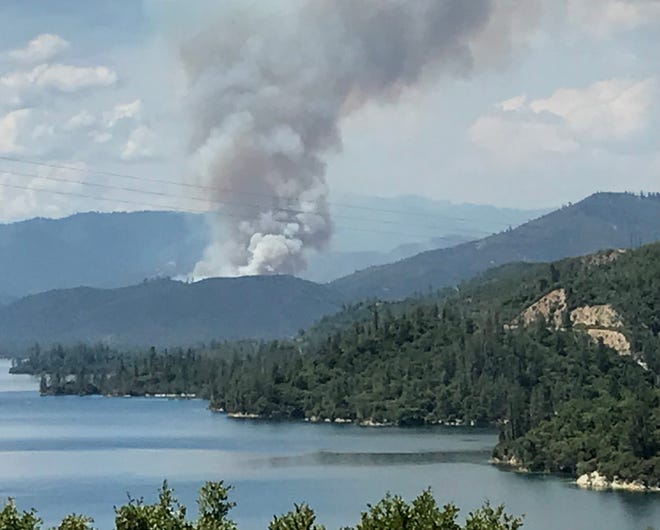 The Carr Fire erupts on July 23, 2018, near Whiskeytown Lake.