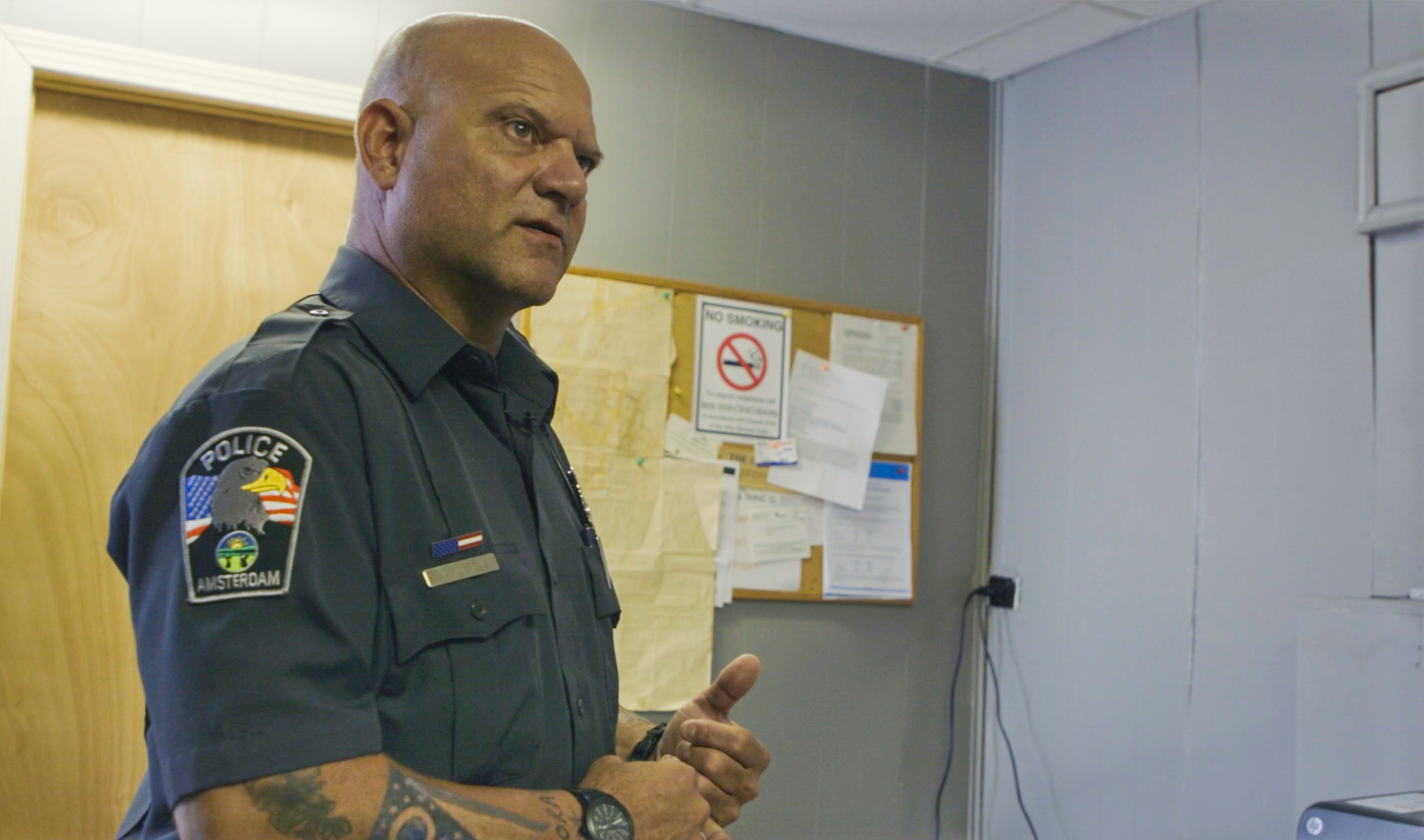 Amsterdam, Ohio Police Chief Todd Walker gives a tour of former Officer Cimperman's station.