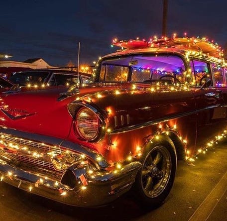 Decorated classic vehicle at Willow Glen Christmas Lights Tour and Toy Drive in San Jose, CA.