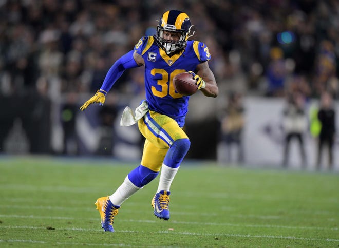 Dec 16, 2018; Los Angeles, CA, USA;  Los Angeles Rams running back Todd Gurley (30) carries the ball in the second quarter against the Philadelphia Eagles at Los Angeles Memorial Coliseum. Mandatory Credit: Kirby Lee-USA TODAY Sports