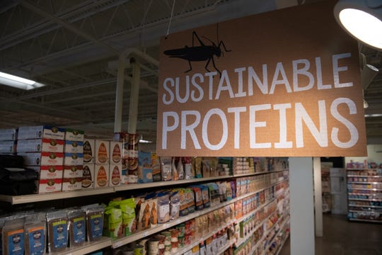 Edible crickets – in a variety of flavors – are on display at Mom's Organic Market in Rockville, MD.