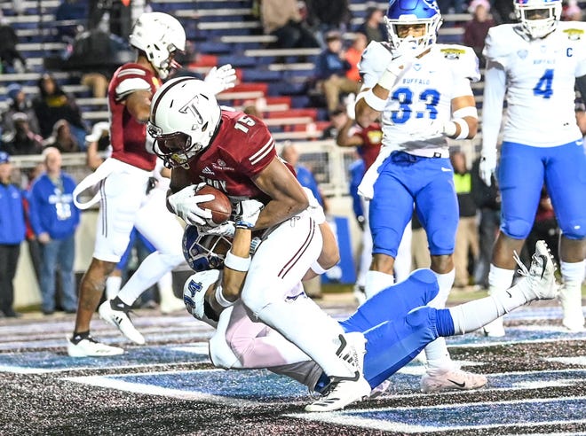 Troy Trojans wide receiver Damion Willis (15) scores a touchdown during the second quarter against Buffalo during the Dollar General Bowl held at Ladd-Peebles Stadium in Mobile on Saturday, Dec. 22, 2018.