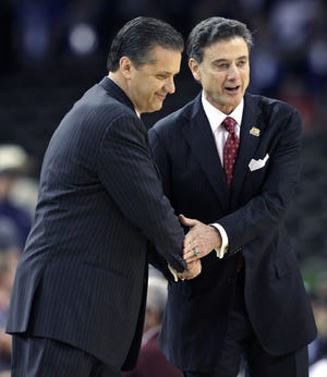 Louisville head coach Rick Pitino, right, shakes hands with Kentucky head coach John Calipari before the first half of an NCAA Final Four semifinal college basketball tournament game in New Orleans.