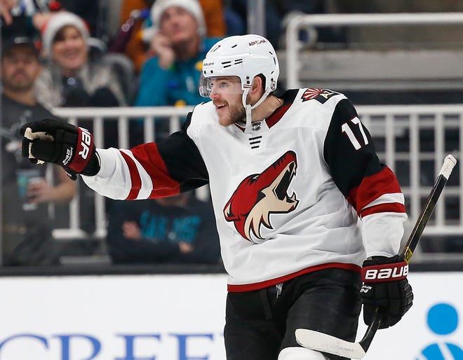 Arizona Coyotes' Alex Galchenyuk (17) celebrates after scoring his second goal of the night against the San Jose Sharks in the second period of an NHL hockey game in San Jose, Calif., Sunday, Dec. 23, 2018. (AP Photo/Josie Lepe)