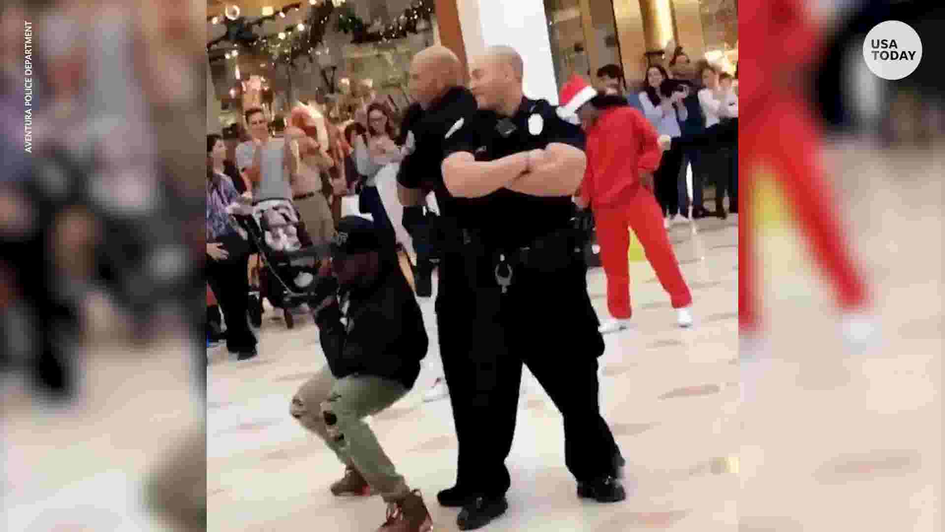 Police Bust A Move During Mall Flash Mob 