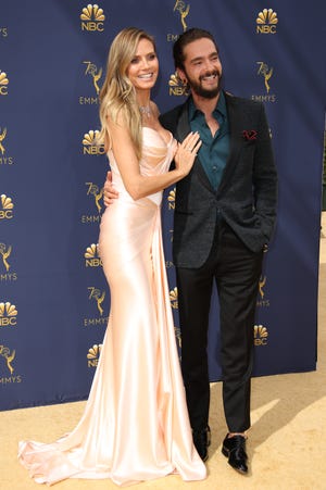 Heidi Klum and Tom Kaulitz, pictured here at the Emmy Awards, announced their engagement on Christmas Eve.