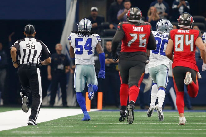 Cowboys linebacker Jaylon Smith (54) said he was not going to let anyone catch him as he returned a fumble against Tampa Bay for his first career touchdown.