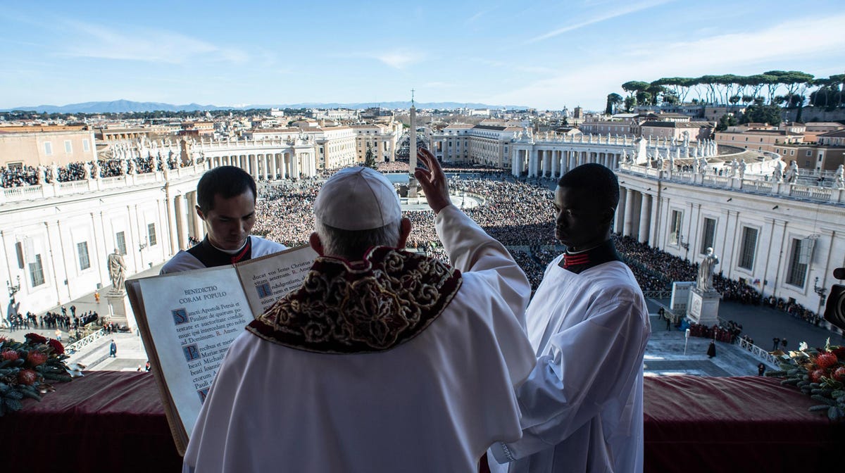 Pope Francis delivers the traditional Urbi et Orbi  Christmas Day blessing from the central balcony of St. Peter's Basilica at the Vatican on Dec. 25, 2018. 