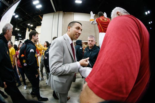 Iowa State head coach Matt Campbell signs an autograph during the Cyclone Spirit Rally on Thursday, Dec. 27, 2018, in San Antonio. Iowa State takes on Washington State in the Valero Alamo Bowl on Friday.