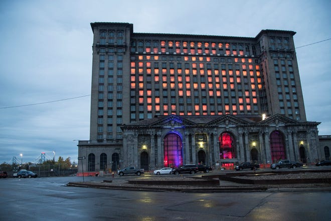 Halloween lights are projected on the windows on Michigan Central Station in Detroit, Tuesday, Oct. 30, 2018. 