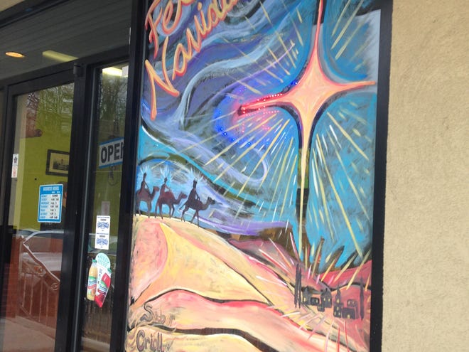 Storefront windows throughout downtown Lebanon have been painted to brighten up the community and have people feel better about what downtown Lebanon has to offer the community. the paintings have been done by Katie Trainer, with sponsorship assistance from Snitz Creek