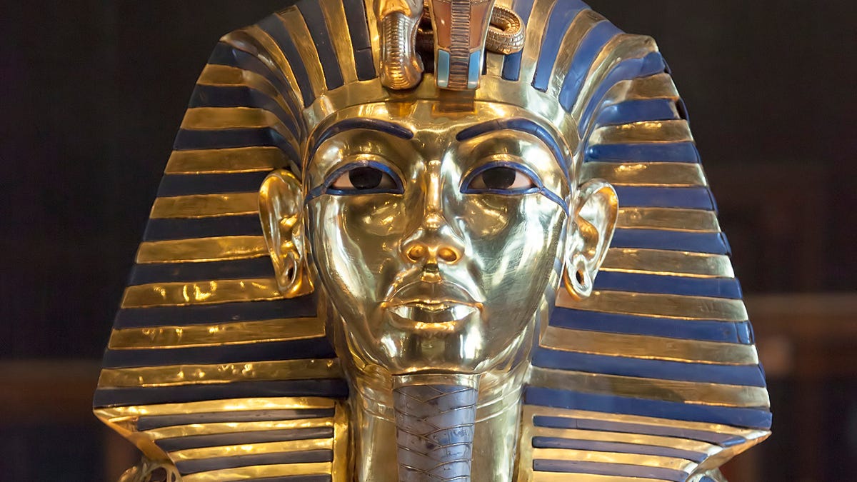 Cairo's Grand Egyptian Museum will be one of the largest museums in the world, displaying artifacts like the funerary mask of King Tutankhamun.