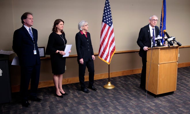 Gov.-elect Tony Evers announced his picks Friday for veterans secretary, financial institutions secretary and budget director. Pictured are Brian Pahnke, his pick for budget director; Kathy Koltin Blumenfeld, his pick for financial institutions secretary; Mary Kolar, his pick for veterans secretary; and Evers.