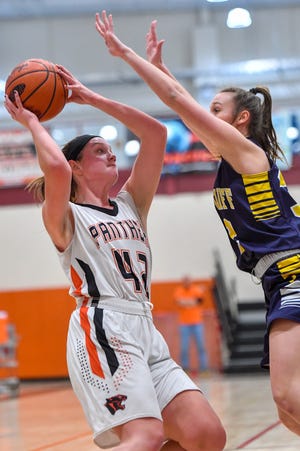 Central York's Emily Prowell is blocked by Ryan Kaercher of Cedar Cliff during the Panther's girls' basketball tournament, Thursday, December 27, 2018.John A. Pavoncello photo	