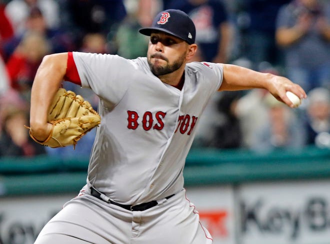 Boston Red Sox relief pitcher Robby Scott delivers a pitch in the eleventh inning of a baseball game against the Cleveland Indians, Sunday, Sept. 23, 2018, in Cleveland. Cleveland won 4-3.