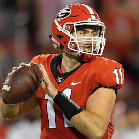Quarterback Jake Fromm leads Georgia into the...