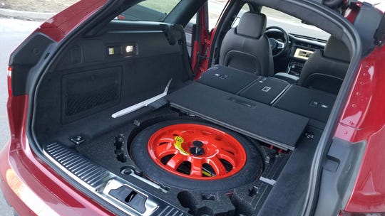 The Jaguar XF Sportbrake comes with loads of cargo room -and a spare tire for when a Detroit pothole eats a tire.