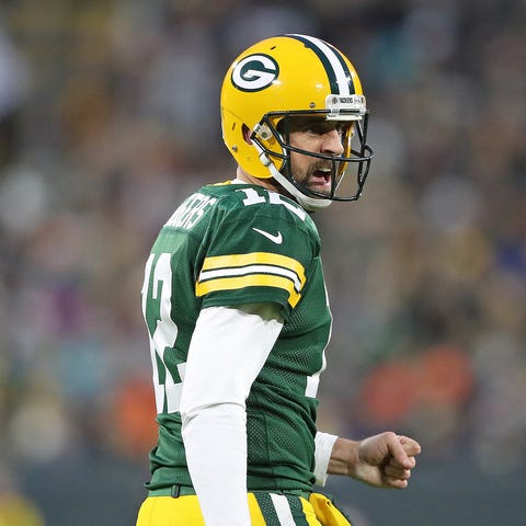 Green Bay Packers quarterback Aaron Rodgers (12)...