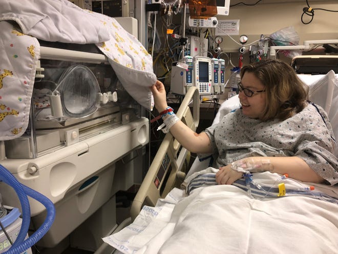 Mary McDannell, 24, of Adams County, looks at her newborn son, Liam McDannell, in the neonatal intensive care unit at York Hospital. Liam, born at only 25 weeks gestation, was the first baby born in 2019 in York County.