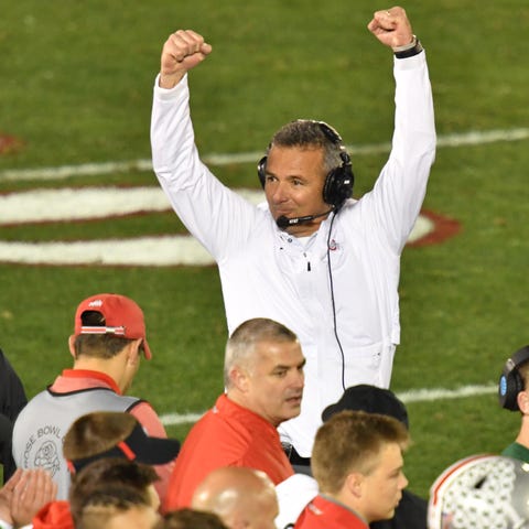 Urban Meyer celebrates as Ohio State defeats...