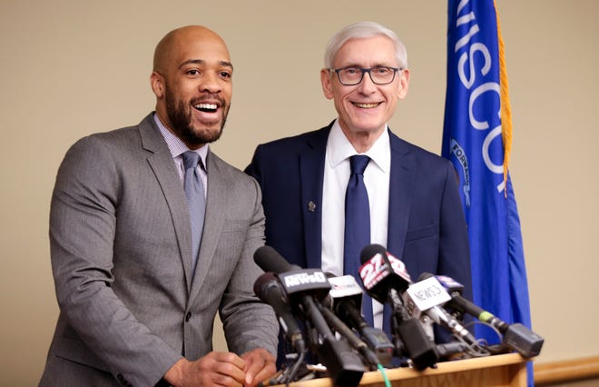 Wisconsin Lt. Gov.-elect Mandela Barnes, left, and Democratic Gov.-elect Tony Evers address the media before announcing five cabinet appointments.