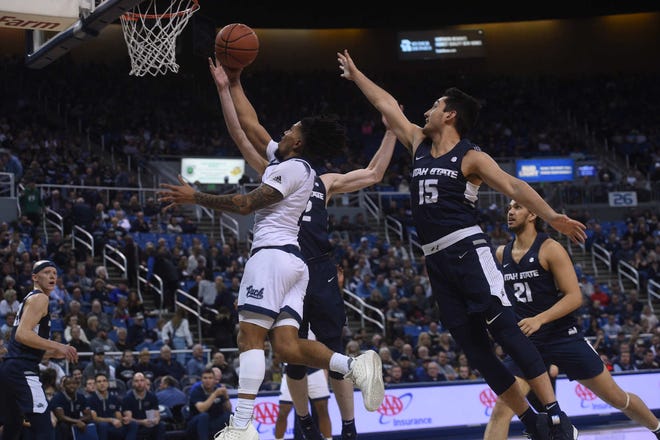 Nevada takes on Utah St. during their basketball game at Lawlor Events Center in Reno on Jan. 2, 2019.