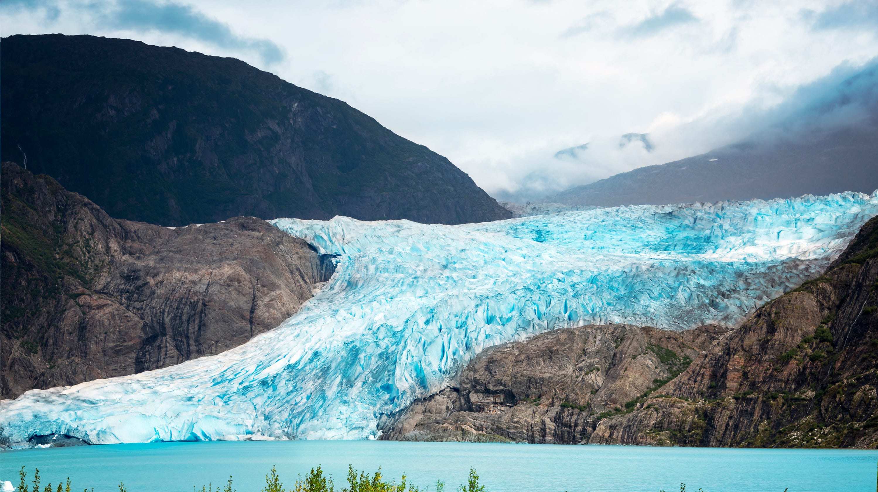 Glaciers melting 390B tons of ice melts annually as globe warms