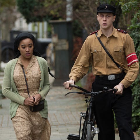 Amandla Stenberg and George MacKay as Leyna and...