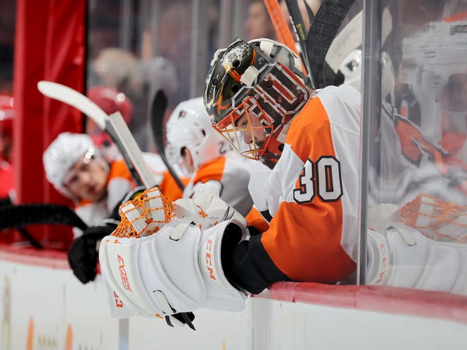 Michal Neuvirth allowed three goals on seven second-period shots and the Flyers lost to the Carolina Hurricanes 5-3 Thursday.