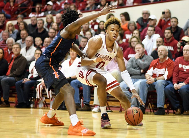 Indiana Hoosiers guard Romeo Langford (0) backs down his defender during the game against Illinois at Simon Skjodt Assembly Hall in Bloomington, Ind., on Thursday, Jan. 3, 2019.