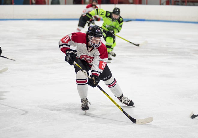 Cleveland Barons Elite forward Lance Mengel skates with the puck during their BAAA-C Silver Stick Finals match against Chicago Mission Friday, Jan. 4, 2019 at Glacier Pointe Ice Complex.