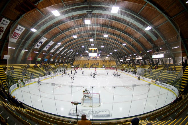 The teams warm up during the men's hockey game between the Sacred Heart Pioneers and the Vermont Catamounts at Gutterson Field House on Friday night January 4, 2019 in Burlington.