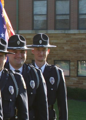 Dale Woods, a Colerain Township officer who suffered critical injuries after being struck by a truck, is seen here while serving in the Colerain Township Police Honor Guard.