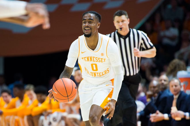 Tennessee's Jordan Bone (0) smiles while dribbling the ball during a college basketball game between Tennessee and Georgia at Thompson-Boling Arena Saturday, Jan. 5, 2019.