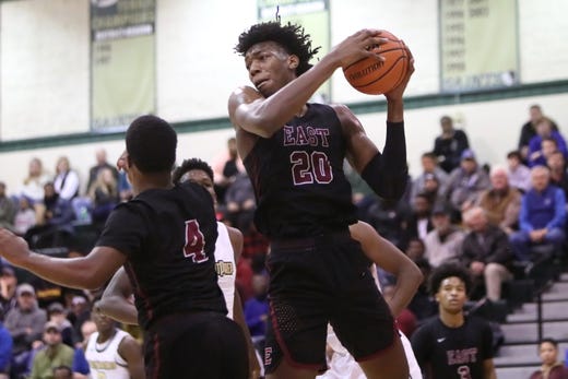 Memphis East's James Wiseman grabs a rebound against Holy Spirit during the Memphis Hoopfest at Briarcrest Christian School on Friday, Jan. 4, 2019.