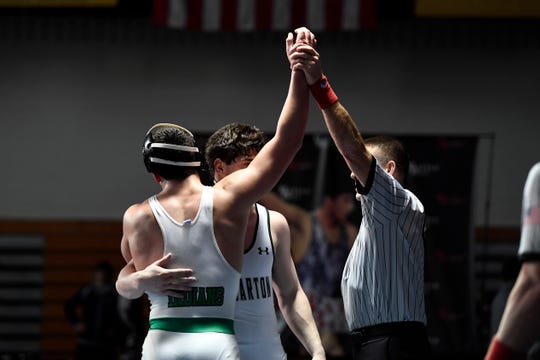 Tommy Chiellini of Pascack Valley, left, wins the 182-pound final as him and Kieran Calvetti of Delbarton hug during the Sam Cali Battle for the Belt final on Sunday, Jan. 6, 2019, in West Orange.